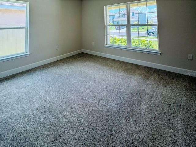 4326 Sagefield Dr, Harmony, FL 34773 - carpeted empty room with baseboards