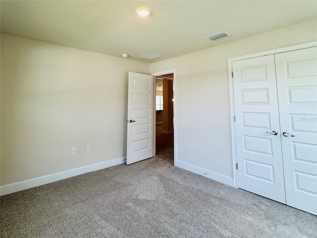 4326 Sagefield Dr, Harmony, FL 34773 - unfurnished bedroom featuring carpet, baseboards, and a closet