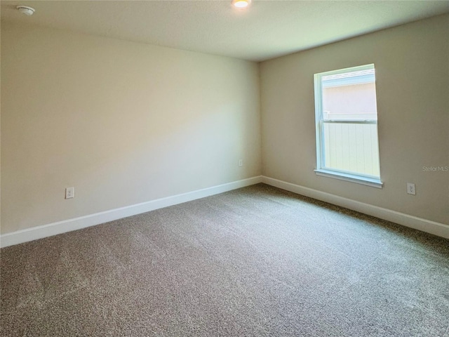 4326 Sagefield Dr, Harmony, FL 34773 - carpeted empty room with baseboards