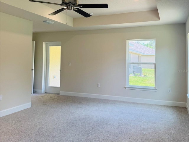 4326 Sagefield Dr, Harmony, FL 34773 - unfurnished room with carpet, healthy amount of natural light, a ceiling fan, and baseboards