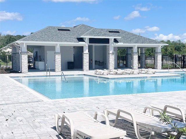 4326 Sagefield Dr, Harmony, FL 34773 - community pool featuring a patio area