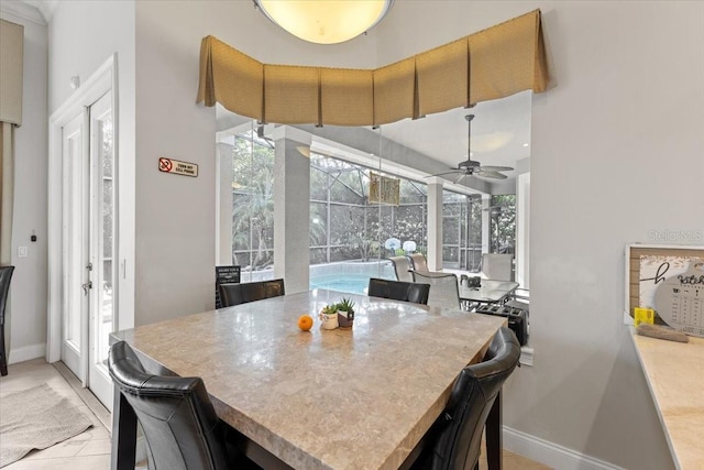 2046 Westover Reserve Blvd, Windermere, FL 34786 - dining space featuring a high ceiling, healthy amount of natural light, baseboards, and a ceiling fan