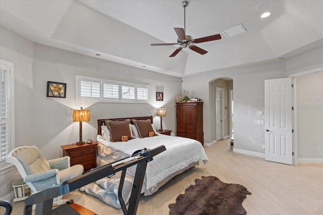 2046 Westover Reserve Blvd, Windermere, FL 34786 - bedroom with arched walkways, light wood finished floors, recessed lighting, baseboards, and ceiling fan