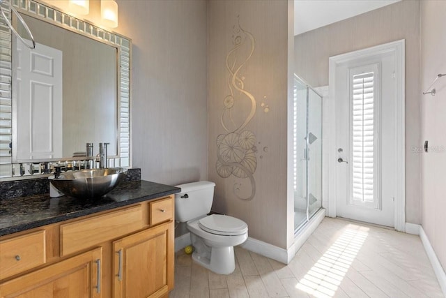 2046 Westover Reserve Blvd, Windermere, FL 34786 - bathroom with a stall shower, toilet, baseboards, and vanity