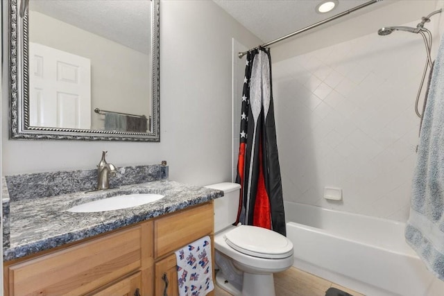 2046 Westover Reserve Blvd, Windermere, FL 34786 - bathroom with shower / bathtub combination with curtain, vanity, toilet, a textured ceiling, and wood finished floors