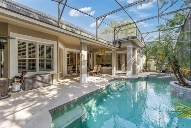 2046 Westover Reserve Blvd, Windermere, FL 34786 - view of swimming pool featuring a patio, a ceiling fan, a pool with connected hot tub, french doors, and glass enclosure