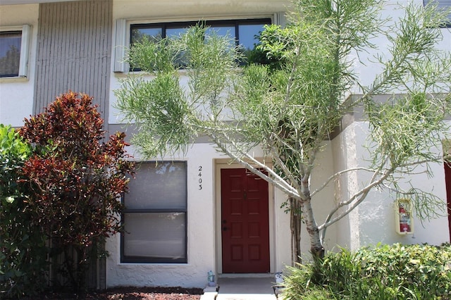 3044 S Oakland Forest Dr Unit 2403, Oakland Park, FL 33309 - property entrance with stucco siding