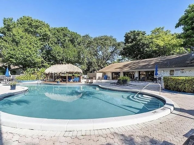 3044 S Oakland Forest Dr Unit 2403, Oakland Park, FL 33309 - community pool featuring a gazebo and a patio