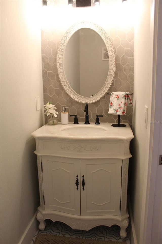 3044 S Oakland Forest Dr Unit 2403, Oakland Park, FL 33309 - bathroom with vanity and baseboards
