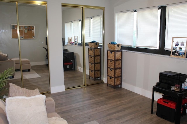 3044 S Oakland Forest Dr Unit 2403, Oakland Park, FL 33309 - living area featuring wood finished floors and baseboards