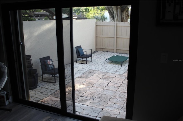 3044 S Oakland Forest Dr Unit 2403, Oakland Park, FL 33309 - entryway featuring wood finished floors