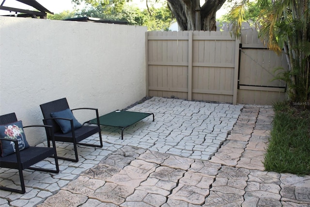 3044 S Oakland Forest Dr Unit 2403, Oakland Park, FL 33309 - view of patio with a gate