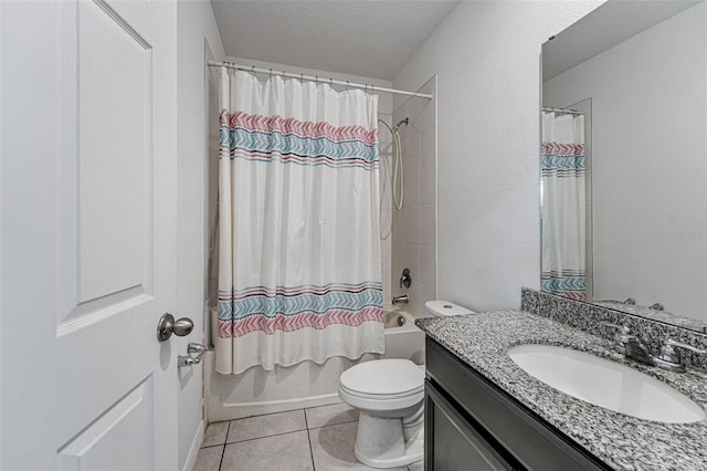 29400 Caspian St, Leesburg, FL 34748 - full bath with vanity, toilet, shower / tub combo with curtain, tile patterned flooring, and a textured ceiling