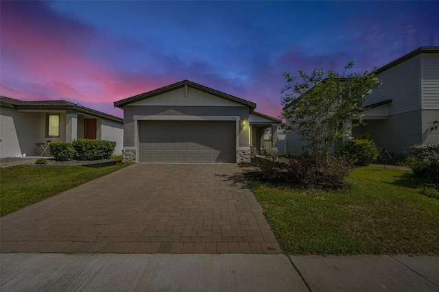 29400 Caspian St, Leesburg, FL 34748 - ranch-style home with stone siding, decorative driveway, and a front lawn
