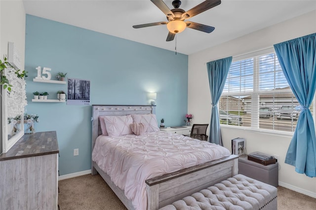 10815 Laxer Cay Loop, San Antonio, FL 33576 - carpeted bedroom featuring baseboards and ceiling fan
