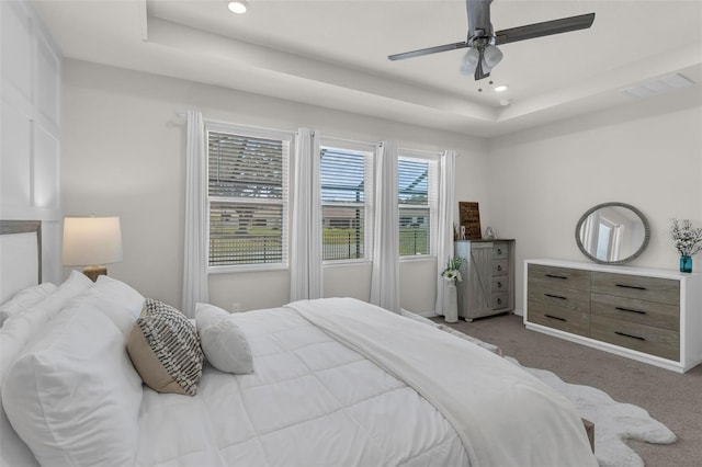 10815 Laxer Cay Loop, San Antonio, FL 33576 - bedroom with carpet, a raised ceiling, recessed lighting, and ceiling fan