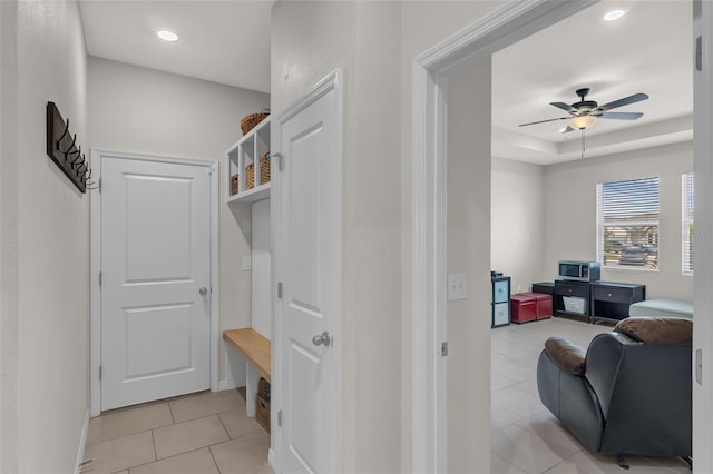 10815 Laxer Cay Loop, San Antonio, FL 33576 - mudroom with light tile patterned floors, ceiling fan, baseboards, and recessed lighting