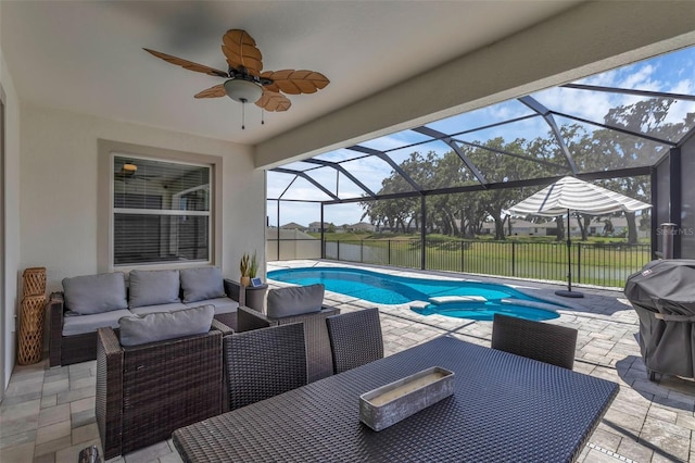 10815 Laxer Cay Loop, San Antonio, FL 33576 - view of pool featuring an outdoor hangout area, a patio, ceiling fan, a pool with connected hot tub, and area for grilling