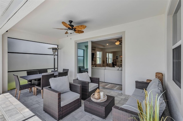 10815 Laxer Cay Loop, San Antonio, FL 33576 - view of patio / terrace with ceiling fan, outdoor dining space, and outdoor lounge area