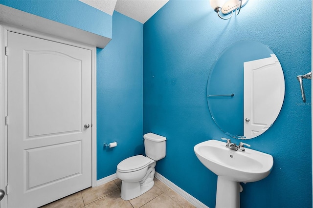 2193 Betsy Ross Ln, Saint Cloud, FL 34769 - half bathroom with tile patterned flooring, toilet, and baseboards