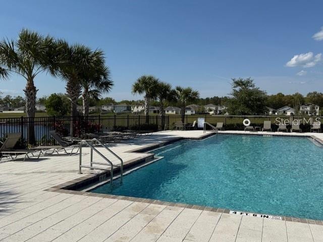 6780 Coral Berry Dr, Mount Dora, FL 32757 - community pool with a patio