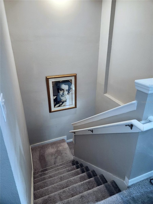 5107 Appenine Loop W, Saint Cloud, FL 34771 - stairway with carpet flooring and baseboards