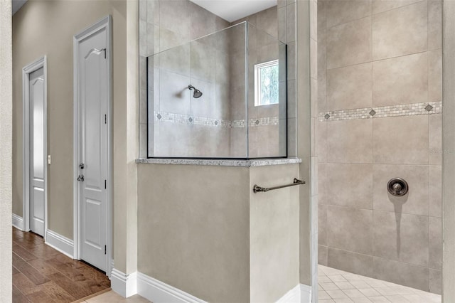 9729 Lake Hugh Dr, Gotha, FL 34734 - full bath featuring a walk in shower, baseboards, and wood finished floors