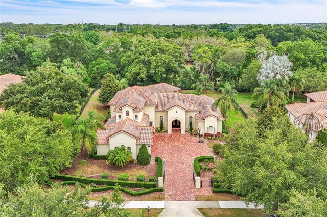 9729 Lake Hugh Dr, Gotha, FL 34734 - view of subject property with a forest