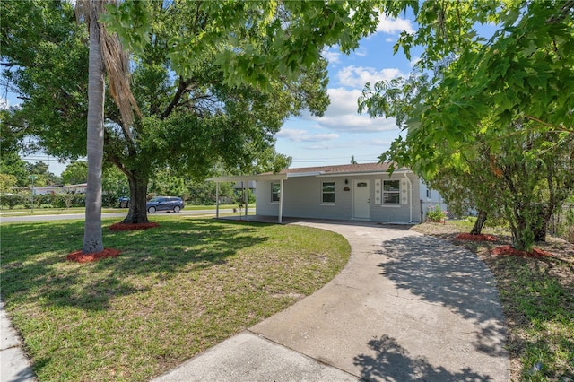7701 Cassino Ave, Orlando, FL 32819 - single story home featuring a front yard and driveway