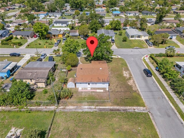 7701 Cassino Ave, Orlando, FL 32819 - aerial view of property and surrounding area with nearby suburban area