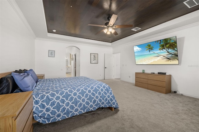 5365 Bowman Dr, Winter Garden, FL 34787 - bedroom featuring arched walkways, a raised ceiling, carpet, ceiling fan, and ornamental molding