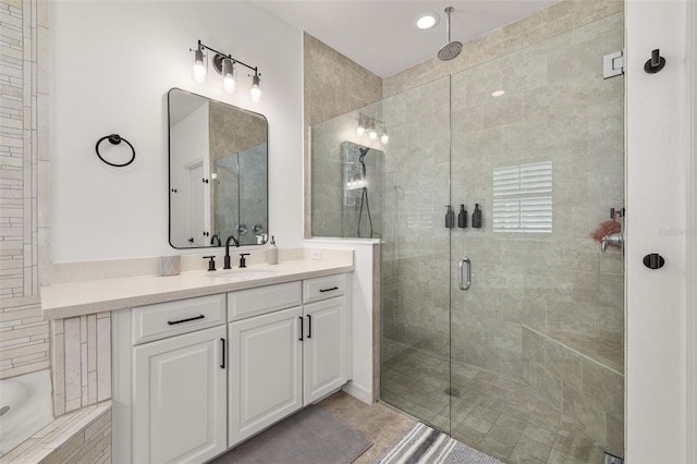 5365 Bowman Dr, Winter Garden, FL 34787 - full bathroom with a shower stall, vanity, and a tub to relax in