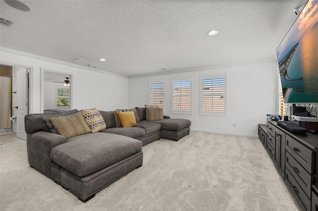 5365 Bowman Dr, Winter Garden, FL 34787 - living room with light colored carpet, ornamental molding, a textured ceiling, and recessed lighting