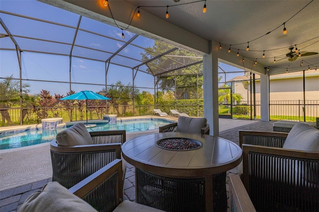5365 Bowman Dr, Winter Garden, FL 34787 - view of patio / terrace with ceiling fan, an outdoor hangout area, and glass enclosure