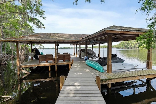 1550 Bluewater Run, Chuluota, FL 32766 - dock featuring boat lift and a water view