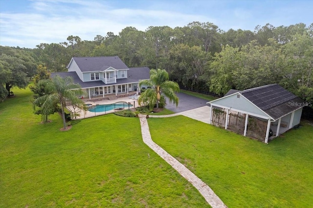 1550 Bluewater Run, Chuluota, FL 32766 - view of subject property with a pool area and a forest