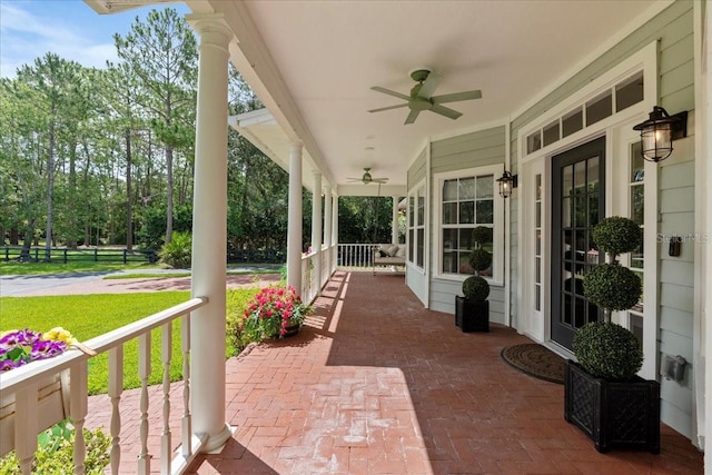 1550 Bluewater Run, Chuluota, FL 32766 - covered porch featuring a ceiling fan