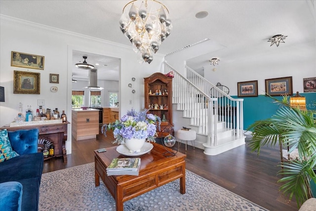 1550 Bluewater Run, Chuluota, FL 32766 - living room with stairway, a chandelier, wood finished floors, and ornamental molding