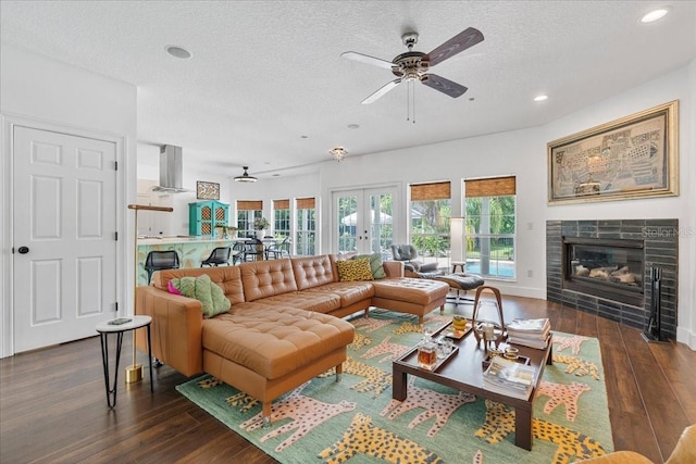 1550 Bluewater Run, Chuluota, FL 32766 - living area with ceiling fan, french doors, wood-type flooring, a textured ceiling, and recessed lighting