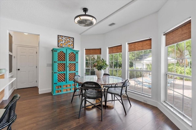 1550 Bluewater Run, Chuluota, FL 32766 - dining space featuring healthy amount of natural light and dark wood-style floors