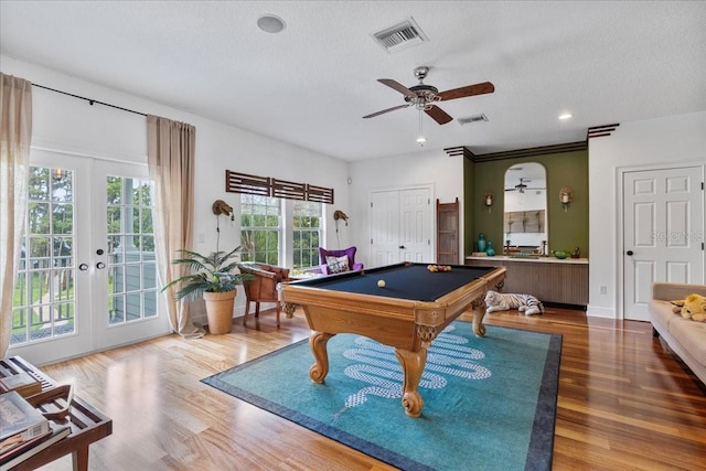 1550 Bluewater Run, Chuluota, FL 32766 - rec room featuring billiards, wood finished floors, ceiling fan, french doors, and a textured ceiling
