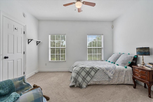 1550 Bluewater Run, Chuluota, FL 32766 - carpeted bedroom with ceiling fan and baseboards