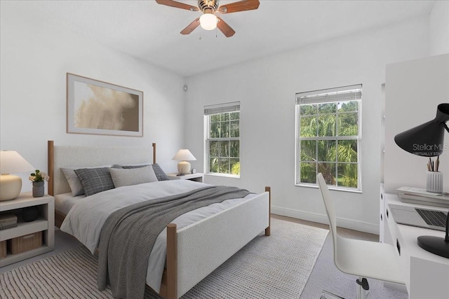 1550 Bluewater Run, Chuluota, FL 32766 - carpeted bedroom featuring a ceiling fan and baseboards