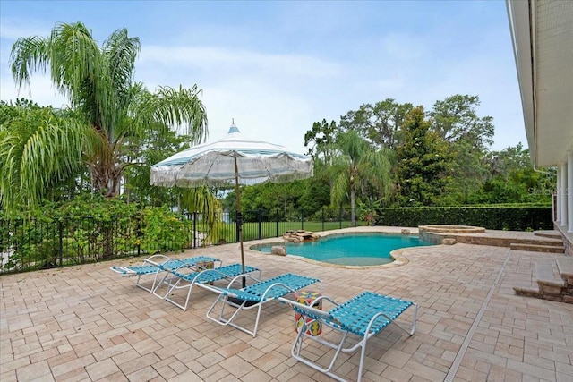 1550 Bluewater Run, Chuluota, FL 32766 - view of swimming pool featuring a patio area, a fenced backyard, and a pool with connected hot tub