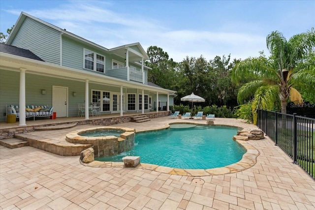 1550 Bluewater Run, Chuluota, FL 32766 - view of swimming pool with a patio area and a pool with connected hot tub