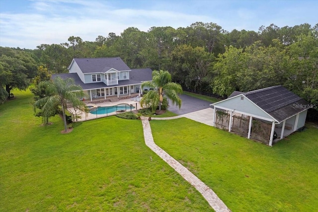 1550 Bluewater Run, Chuluota, FL 32766 - view from above of property featuring a pool and a heavily wooded area