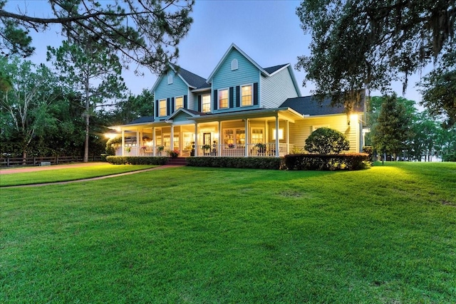 1550 Bluewater Run, Chuluota, FL 32766 - view of front of home with a front lawn and covered porch