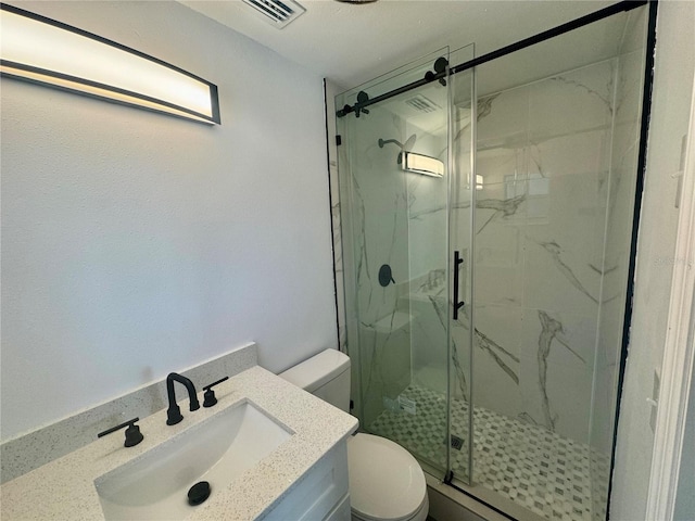 804 Starke Lake Cir, Ocoee, FL 34761 - full bathroom featuring toilet, a marble finish shower, and vanity