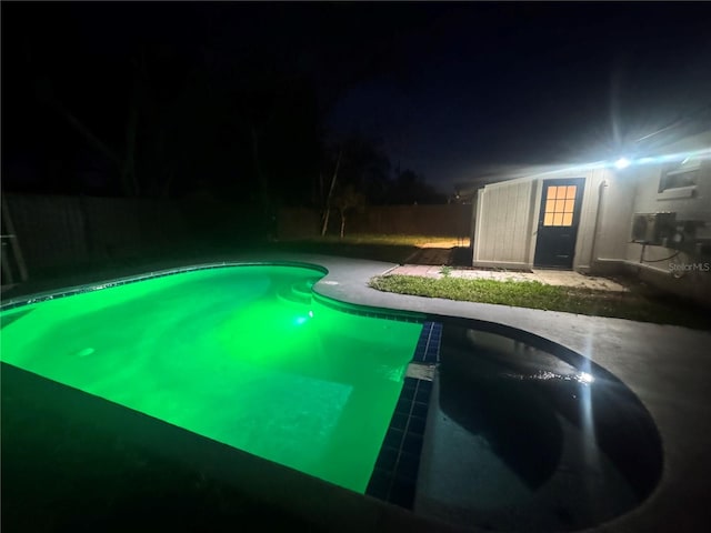 804 Starke Lake Cir, Ocoee, FL 34761 - pool at night with a patio