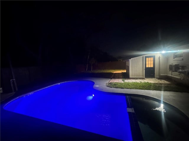804 Starke Lake Cir, Ocoee, FL 34761 - pool at night with a patio